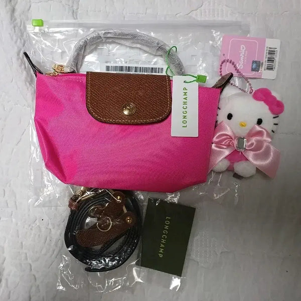[BUNJANG] Longchamp Le Pliage Pink Crossbody Bag with Strap, Sanrio Charm, and Inner Bag / 정품새상품 롱샴 르플리아쥬 핑크 + 스트랩 + 산리오키링 + 이너백