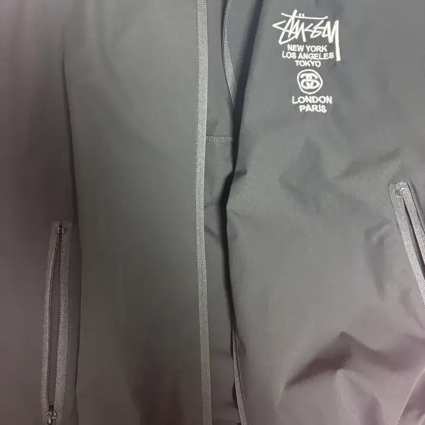 [BUNJANG] Stussy Embroidered World Tour Hooded Windbreaker / 스투시 자수 월드투어 후드 바람막이