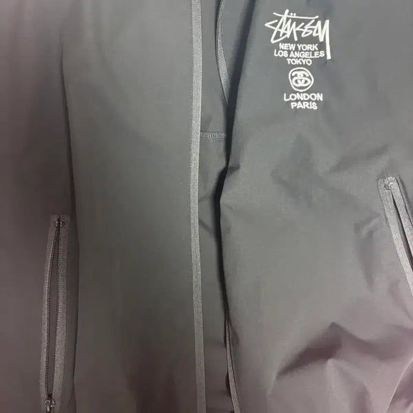 [BUNJANG] Stussy Embroidered World Tour Hooded Windbreaker / 스투시 자수 월드투어 후드 바람막이