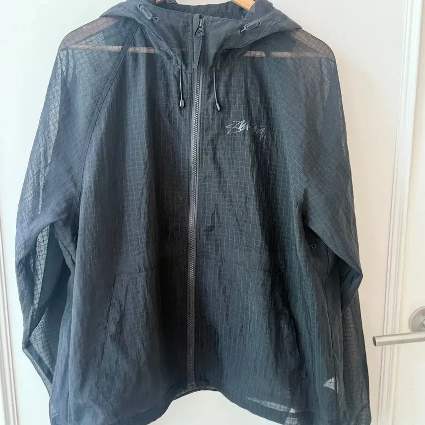 [BUNJANG] Stussy Beach Shell Transparent Ripstop Jacket - Black / 스투시(Stussy) 비치 쉘 트랜스패런트 립스탑 블랙 재킷