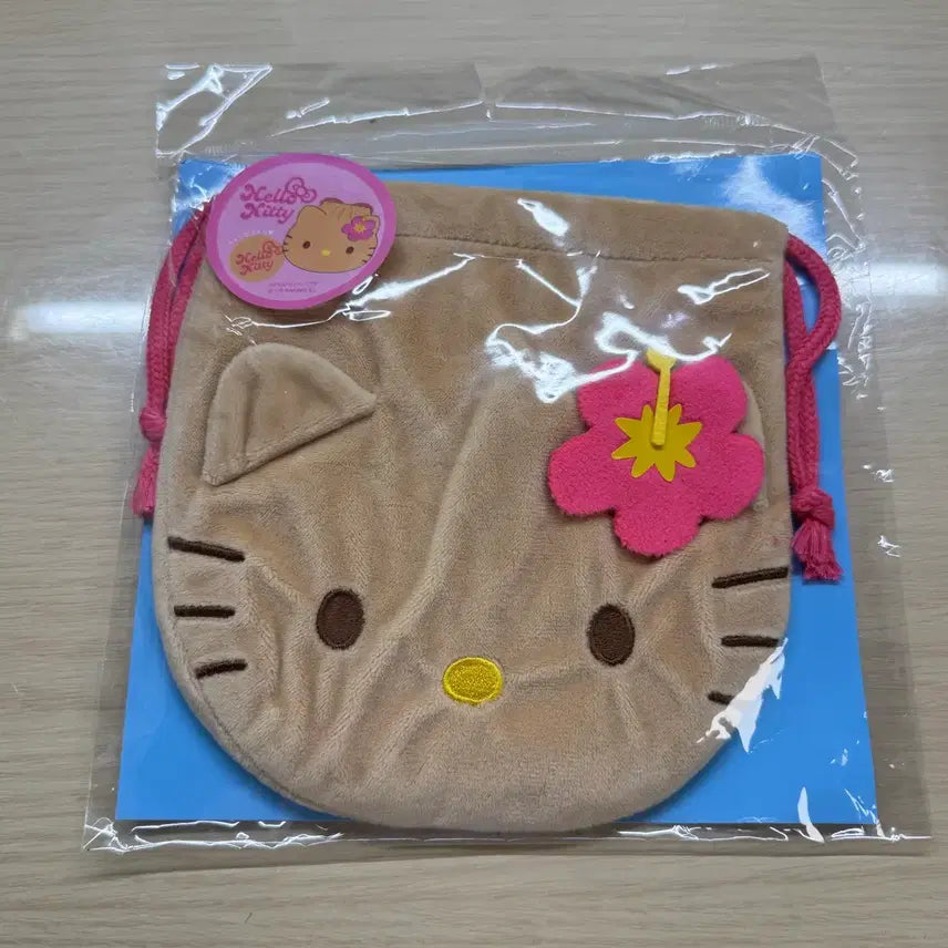 [BUNJANG] Sanrio Hello Kitty Tanning Drawstring Pouch / 태닝 키티 복조리 파우치 산리오 일본 정품
