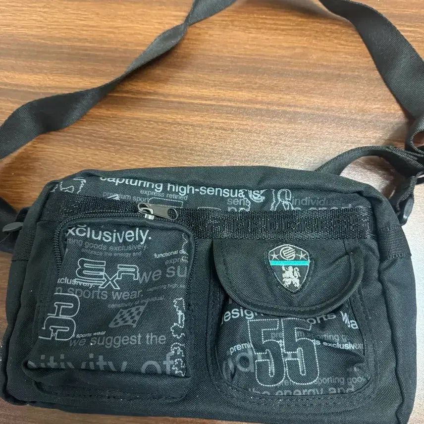 [BUNJANG] EXR Lettering Graphic Crossbag Black / EXR 레터링 그래픽 크로스백 블랙