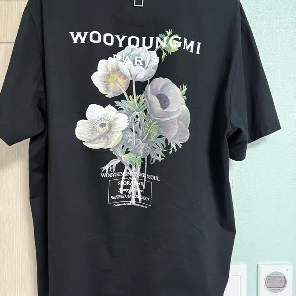 [BUNJANG] Wooyoungmi Flower Print Back Logo T-Shirt Black / [급매] 우영미 플라워 프린트 백로고 반팔-23FW 50