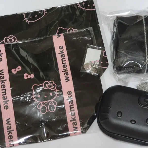[BUNJANG] WAKEMAKE Hello Kitty Raffia Bag / 웨이크메이크 헬로키티 파우치 레디백 타포린백