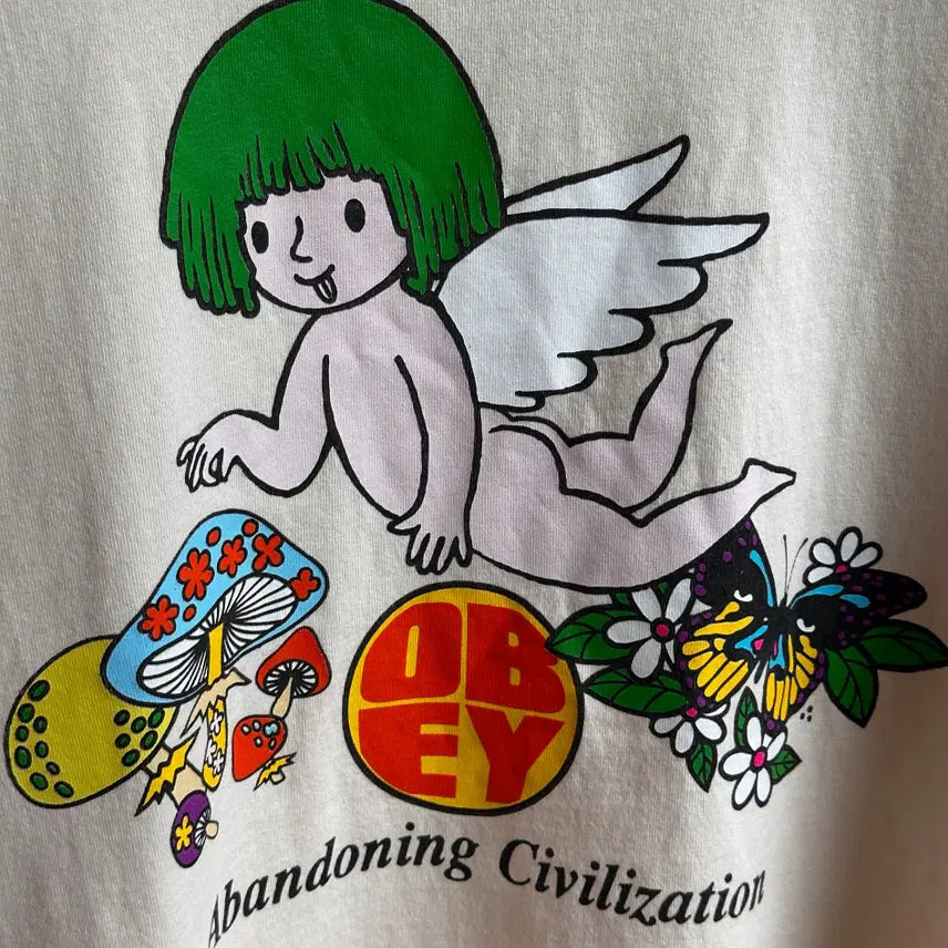 [BUNJANG] OBEY Abandoning Civilization Angel Graphic T-Shirt Butter / [OBEY] 오베이 어밴더닝 시빌라이제이션 엔젤 그래픽 반팔 티셔츠 버터