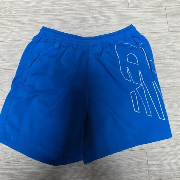 [BUNJANG] New Balance Blue Logo Printing Shorts / S 뉴발란스 반바지 파랑색 로고 프린팅