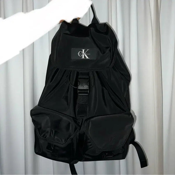 [BUNJANG] Calvin Klein Jeans Reversible Two-Pocket Backpack / Calvin Klein Jeans 켈빈클라인 리버서블 플랩 투포켓 백팩