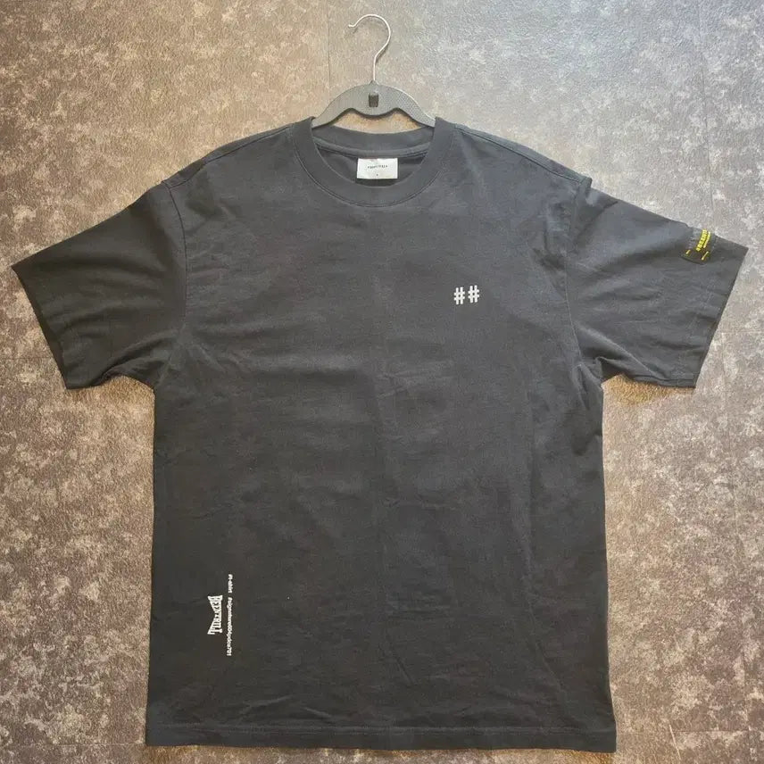 [BUNJANG] BEENTRILL Yellow Taping Hashtag Short Sleeve T-Shirt M / 빈트릴(BEENTRILL) '옐로우 테이핑 해시태그 반팔"