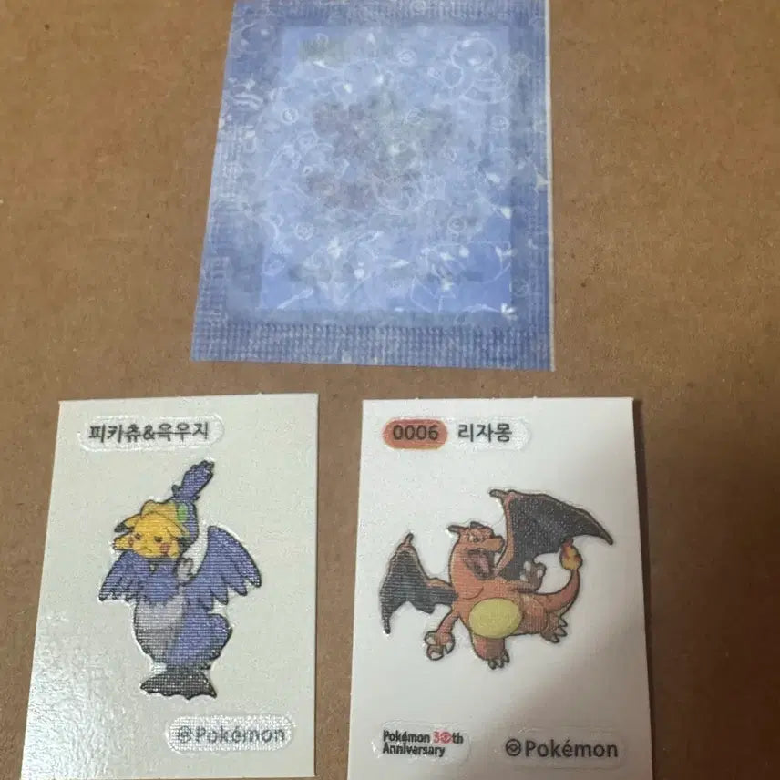 [BUNJANG] Pokemon 30th Anniversary Charizard + Pichu (Sealed) & Pikachu Ukwu ji Stickers / 포케몬 30주년 리자몽+피츄(미개봉) &피카츄윽우지 띠부씰