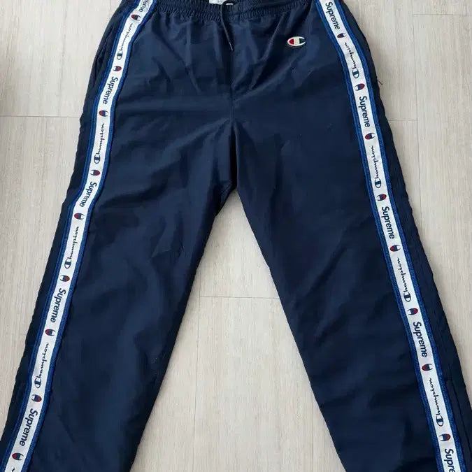 [BUNJANG] Supreme x Champion Taped Track Pants Navy S / 슈프림 x 챔피온 테이핑 트랙팬츠 네이비 S
