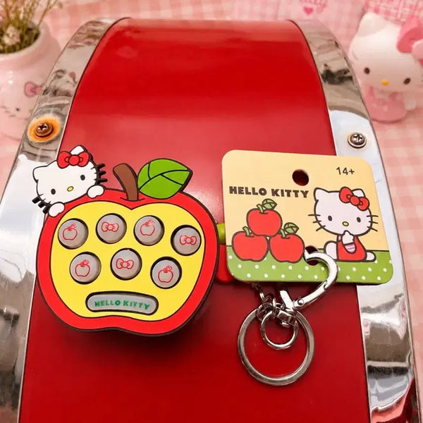 [BUNJANG] Sanrio Hello Kitty Apple-Shaped Game Console Keychain / 헬로키티 사과모양 게임기 키링 산리오 정품