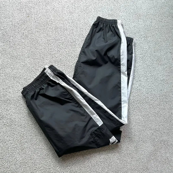 [BUNJANG] Nike SB Shield Swoosh Track Woven Pants M / 나이키 SB 쉴드 스우시 트랙 우븐팬츠 M