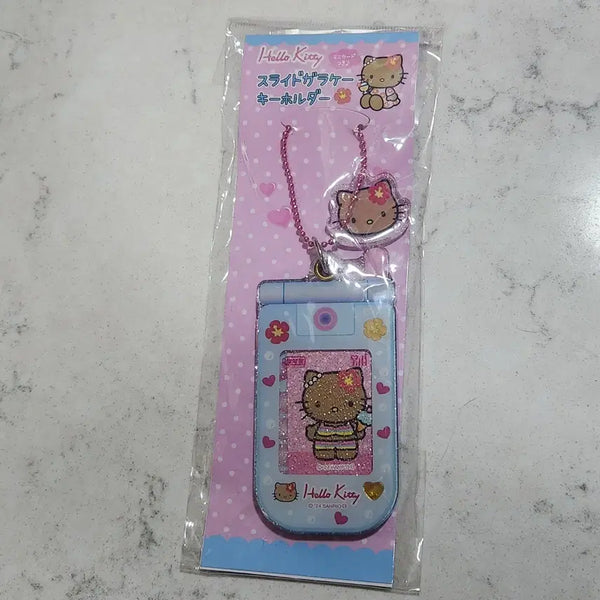 [BUNJANG] Hello Kitty Go Go Girl Tanning Kitty Keychain Proof Photo Photocard / 헬로키티 고고걸 태닝 키티 키링 증명사진 포카