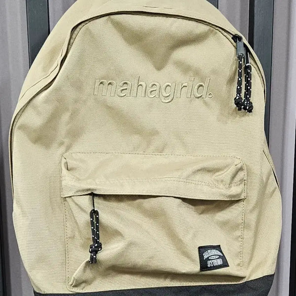 [BUNJANG] Mahagrid Two Pocket Logo Backpack Beige / 마하그리드 투포켓 로고 백팩 (베이지/FREE)