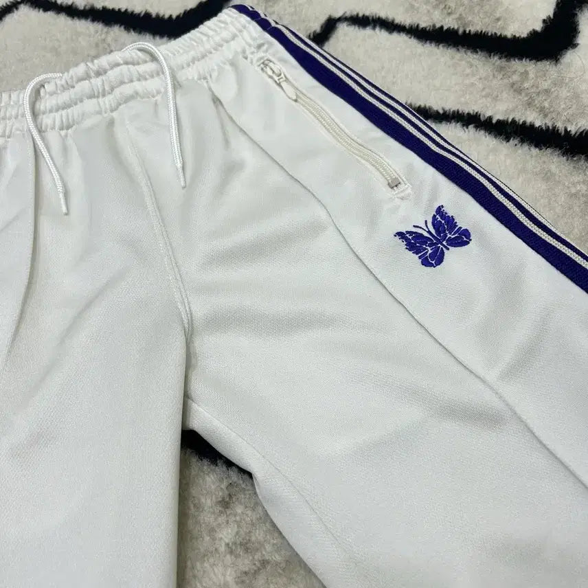 [BUNJANG] Needles Butterfly Logo Track Pants / [1]니들스 나비 로고 트랙팬츠