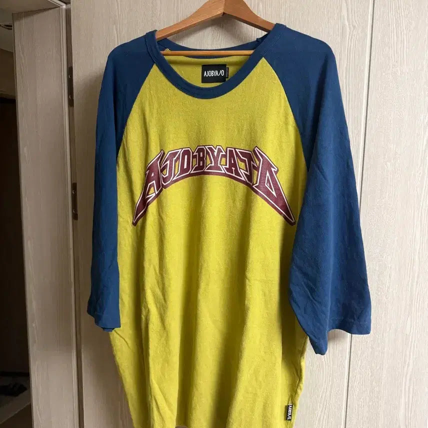 [BUNJANG] AJO BY AJO Big Logo Oversized 7-Sleeve Raglan T-Shirt (Yellow/Blue) / 아조바이아조 빅로고 오버핏 7부 래글런 티셔츠 (옐로우/블루)