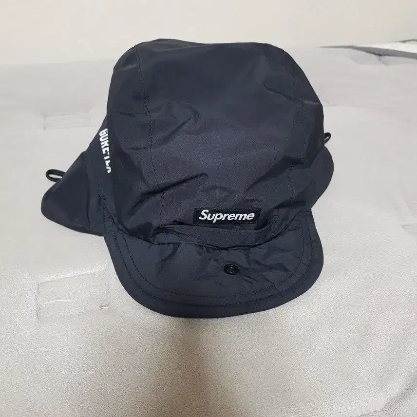 [BUNJANG] Supreme 24FW Gore-Tex Earflap Cap Black / 슈프림 이어플랩 고어텍스 캡 모자 블랙 24FW