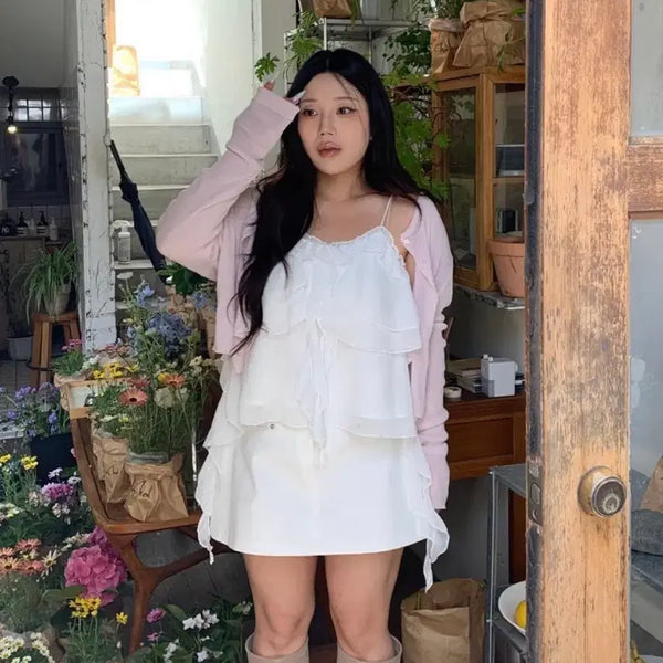 [BUNJANG] DAISYTUEL Zenith Back Banding Asymmetric Frill Sleeveless Blouse / 데이지투엘 제니스 뒷밴딩 언발 프릴 나시 블라우스