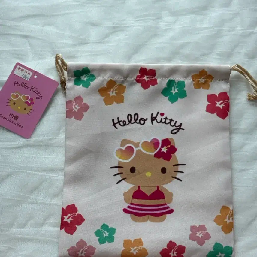[BUNJANG] Sanrio Hello Kitty Tanning Kitty Pouch / 산리오 헬로키티 태닝키티 복조리 파우치