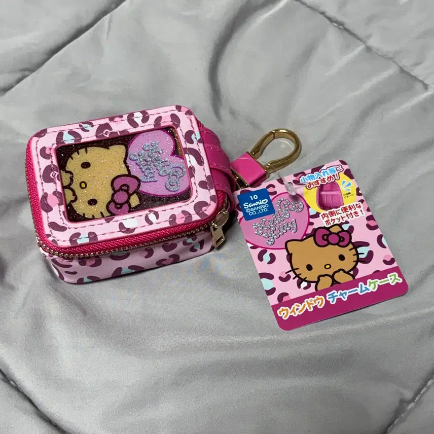 [BUNJANG] Hello Kitty Tanning Leopard Mini Pouch Airpod Case Keychain / 헬로키티 태닝 호피 레오파드 미니파우치 에어팟케이스 키링 핑크