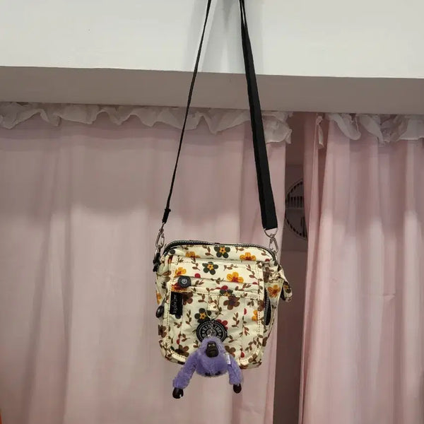 [BUNJANG] Kipling Floral Crossbody Bag with Purple Monkey Keychain / 키플링 꽃무늬 크로스백 + 퍼플 원숭이 키링