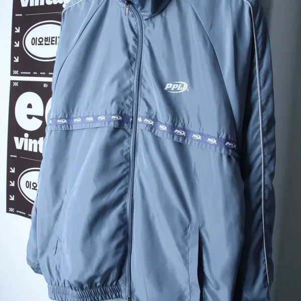 [BUNJANG] W(F) Satin Zip-up Windbreaker Jumper Jacket with Back Logo - Blue / W(F) 크럼프 집업 바람막이 점퍼자켓 백로고 새틴 블루-H35472
