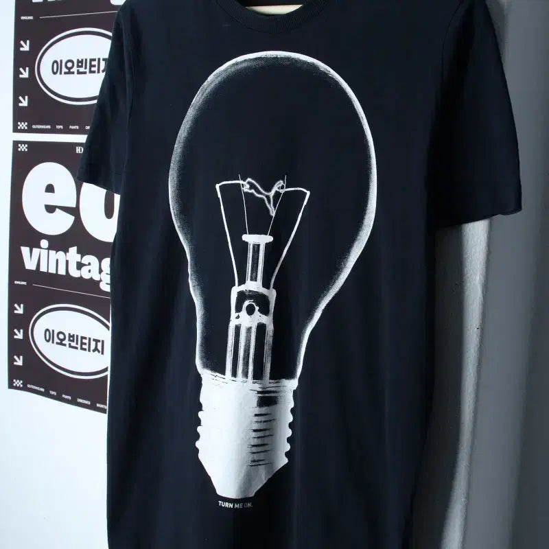 [BUNJANG] Puma Printing Short Sleeve T-Shirt Black Old School / W(L) 퓨마 반팔 티셔츠 프린팅 블랙 올드스쿨-H35443