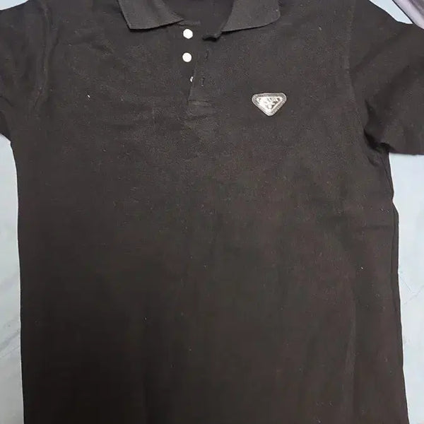 [BUNJANG] Prada Black Short Sleeve Polo Shirt with Metal Triangle Logo / 프라다 카라티 삼각 메탈로고