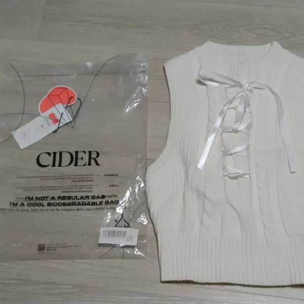 [BUNJANG] Shop Cider Lace-Up Sleeveless Knit Top - White / 샵사이다 레이스업 민소매 니트 탑 화이트