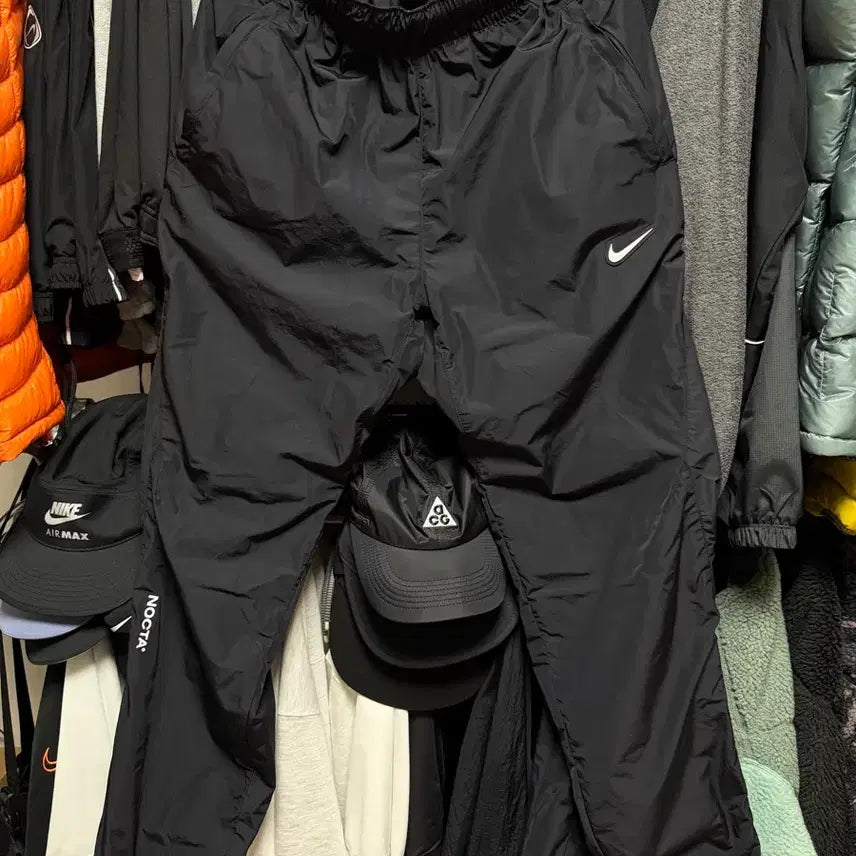 [BUNJANG] Nike x Drake NOCTA Woven Track Pants Black FN7668-010 (S) / 나이키 x 드레이크 녹타 우븐 트랙 팬츠 블랙 FN7668-010 (S)