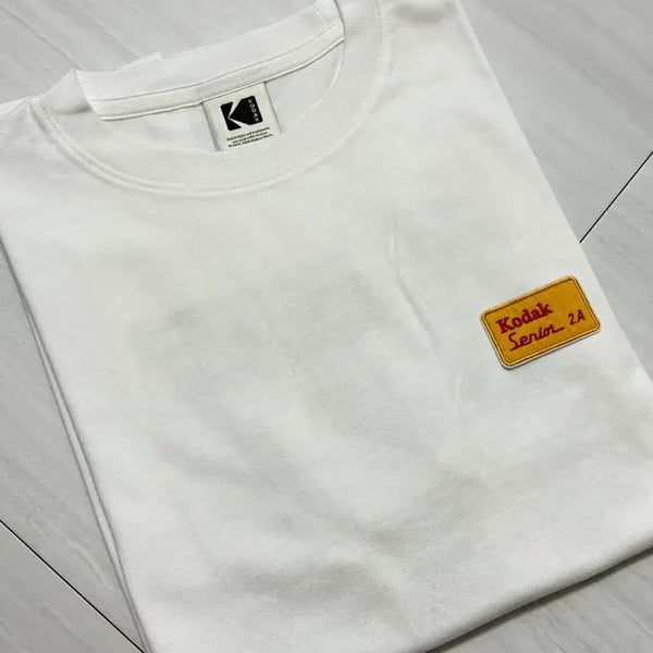 [BUNJANG] Kodak Apparel Treasure Island Graphic Semi-Oversized Short-Sleeve T-Shirt White S / 코닥 어패럴 트레져 아일랜드 백그래픽 세미오버핏 반팔 티셔츠 화이트 S