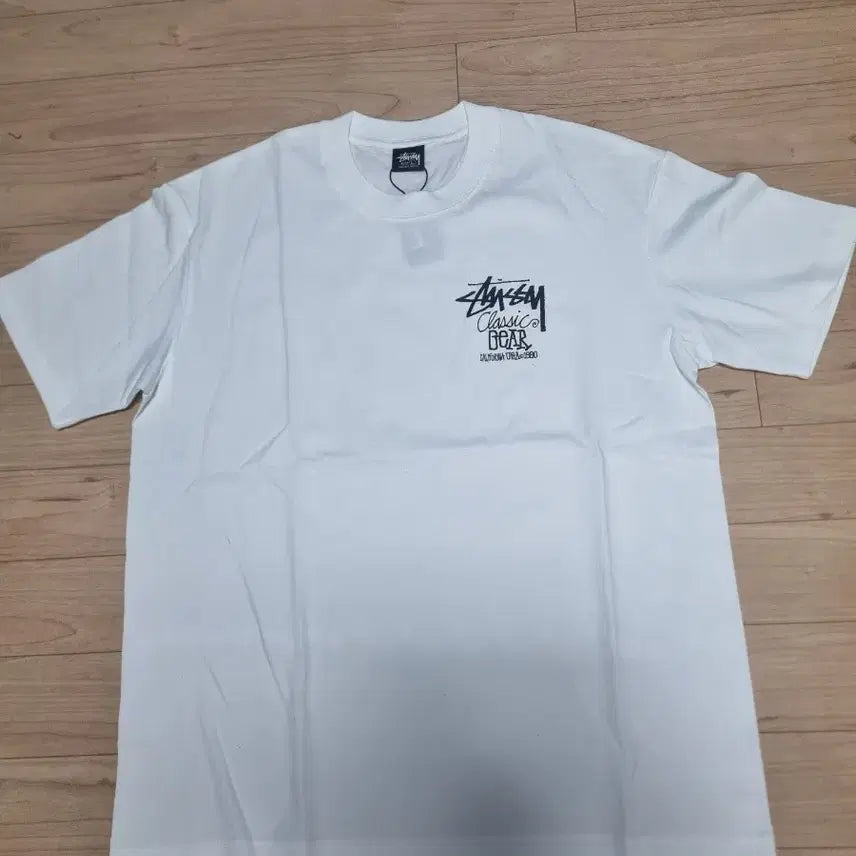 [BUNJANG] Stussy Classic Gear Short Sleeve T-Shirt White / 스투시 클래식 기어 반팔 티셔츠 화이트 L/XL