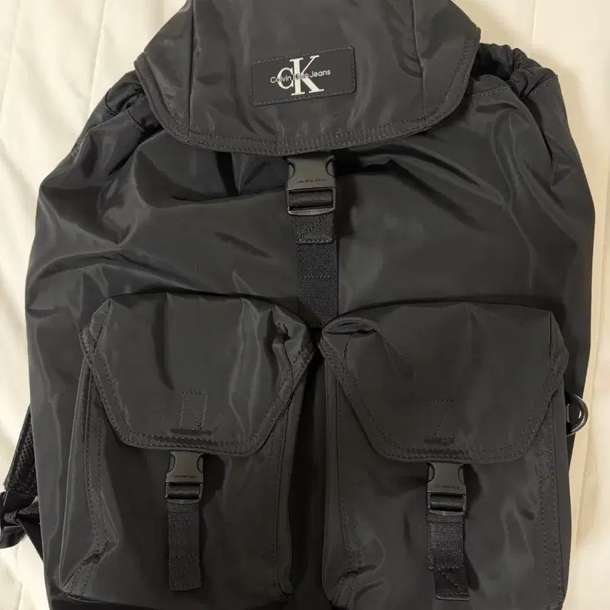 [BUNJANG] Calvin Klein CKJ Reversible Black Two-Pocket Backpack / 캘빈클라인 CKJ 리버서블 블랙 투포켓 백팩