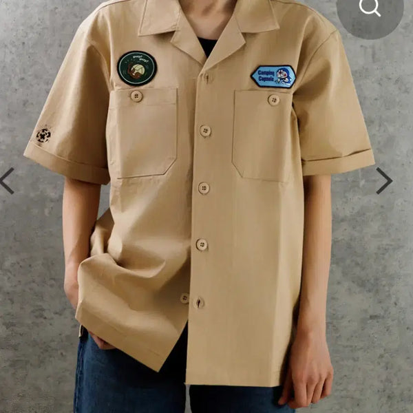 [BUNJANG] Doraemon Limited Edition Dinosaur Arc Work Shirt (Nobita Beige) / [한정판] 도라에몽 미래백화점 대장편 와펜 워크 셔츠 (진구의 공룡 베이지)