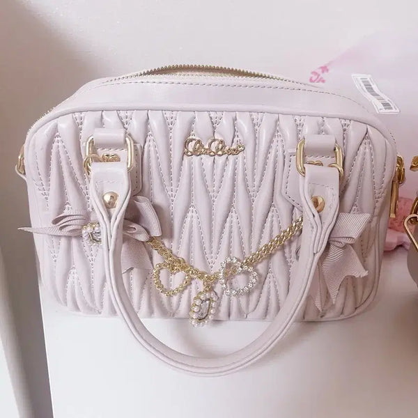 [BUNJANG] Lizzlisa Quilting Ribbon Charm Mini Bag / 리즈리사 퀼팅 리본 참 미니백