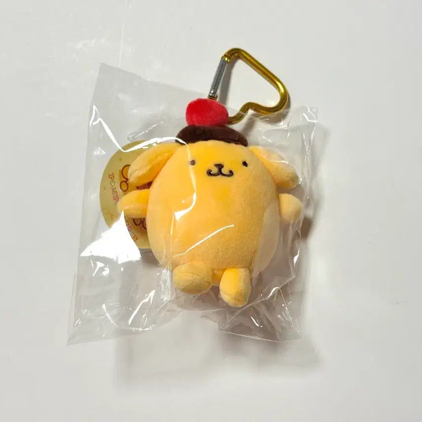 [BUNJANG] Sanrio Pompompurin Pudding Mascot Plush Keychain / [미개봉] 푸딩 무뉴구루미 해피플레이버 폼폼푸린 마스코트 누이 인형 키링 카라비너