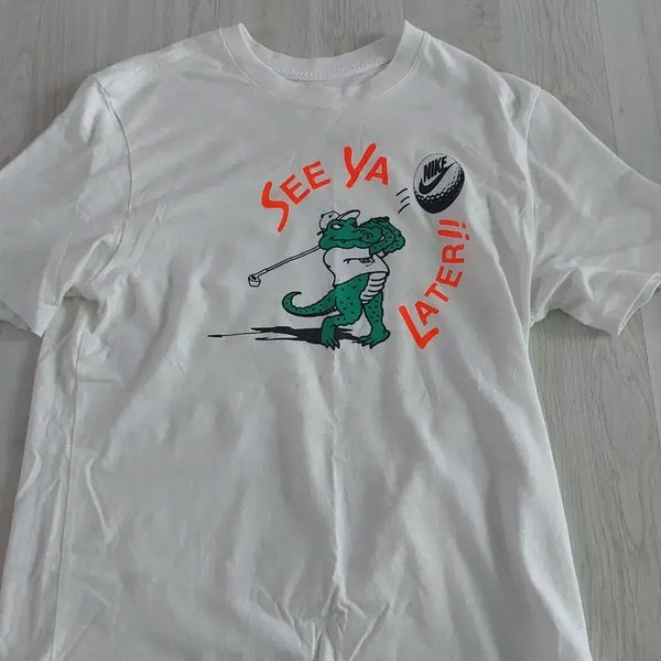 [BUNJANG] Nike Golf Crocodile Character Short Sleeve T-Shirt - White / 나이키 골프 캐릭터 반팔 티셔츠 화이트