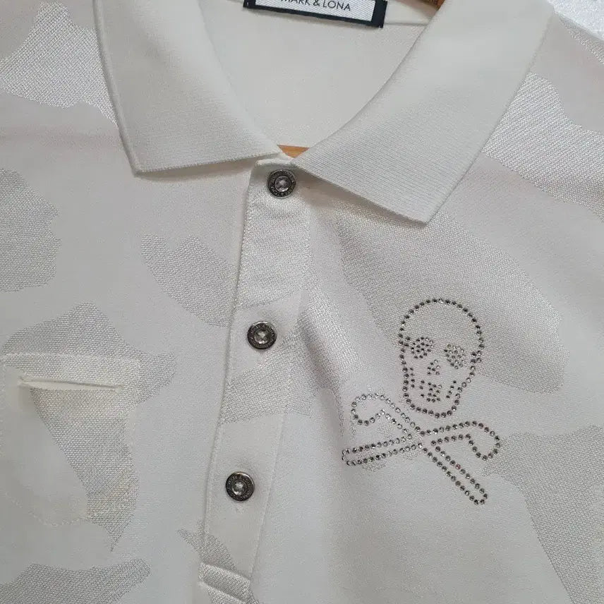 [BUNJANG] Mark &ロナ Camouflage Pearl Skull Short-Sleeve Polo Shirt White / 마크앤로나 카모플라쥬 펄 스컬 반팔 카라티 화이트100