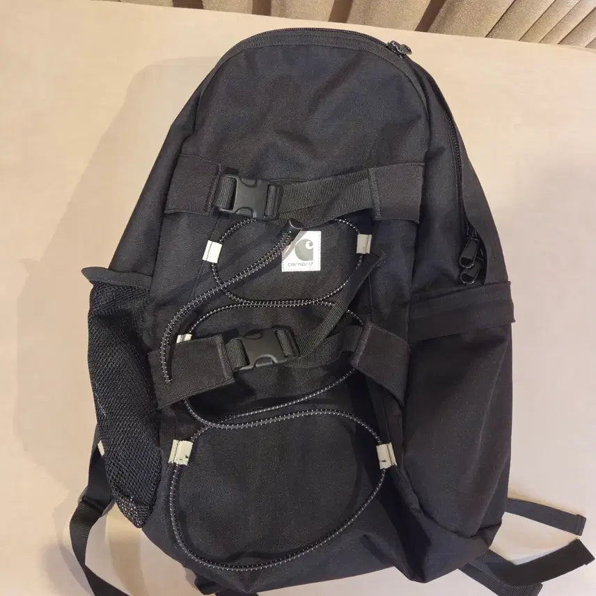 [BUNJANG] Carhartt WIP Reflective Kickflip Backpack Black / 칼하트 WIP 리플렉티브 킥플립 백팩