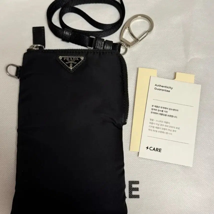 [BUNJANG] Prada Re-Nylon Mini Pouch Bag with Strap / 프라다 리나일론 파우치백 미니파우치 가방 폰파우치(스트랩증정)