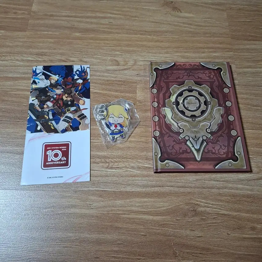 [BUNJANG] Arc System Works 10th Anniversary Popup Exclusive Guilty Gear Book of Beginnings Notepad & BlazBlue Noel Acrylic Keyring / 아크시스템웍스 10주년 팝업 특전 길티기어 시작의서 노트+ 블레이블루 노엘 아크릴 키링 특전