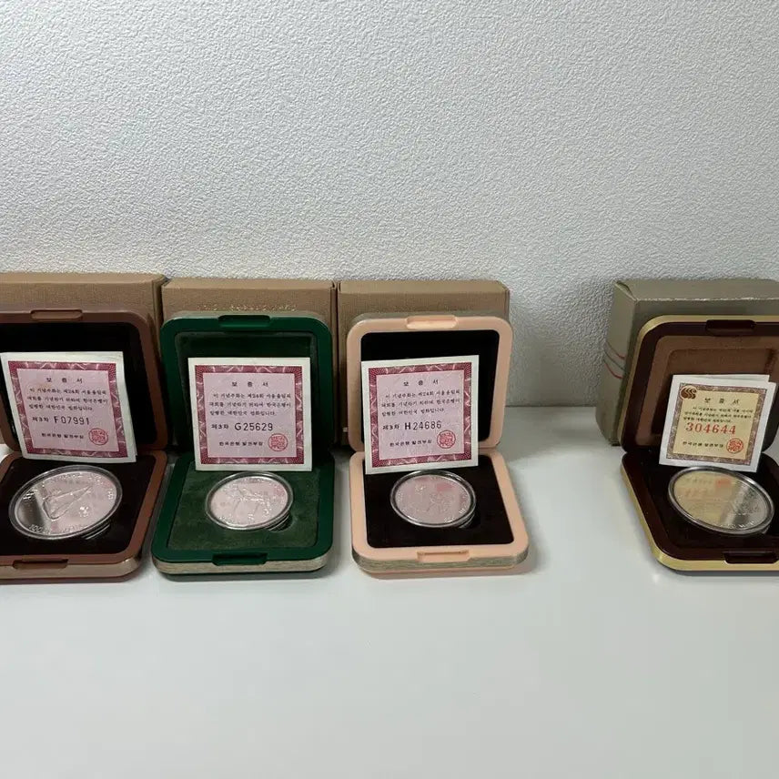 [BUNJANG] 1988 Seoul Olympics Proof Commemorative Silver Coins (1st-3rd Series) & 1986 Seoul Asian Games Proof Commemorative Silver Coin / 1988 서울올림픽 프루프 기념은화 1~3차 + 1986 서울아시안게임 프루프 기념은화 (보증서 포함)