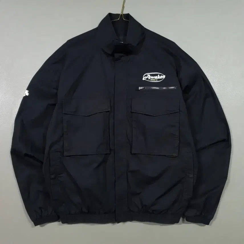 [BUNJANG] Descente 22ss Awakeen Graphic Out Pocket Windbreaker Jacket Black / M (95) 데상트 신형 22ss 어웨이큰 그래픽 아웃 포켓 바람막이 자켓 블랙