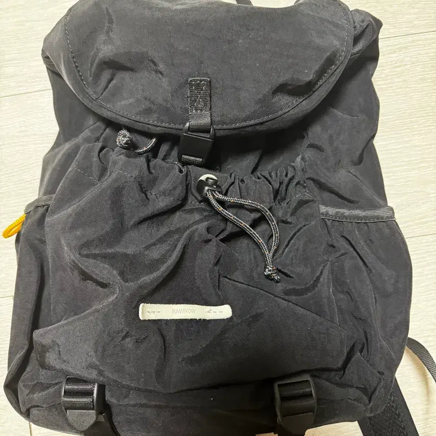[BUNJANG] LOWRONE String Mini Ruck Sack Backpack Black / 로우로우 스트링 미니 럭색 백팩 블랙
