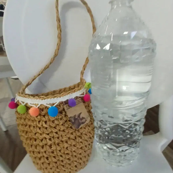 [BUNJANG] Pom Pom Decor Raffia Barrel Shoulder Bag / 폼폼 장식 라피아 원통형 숄더백