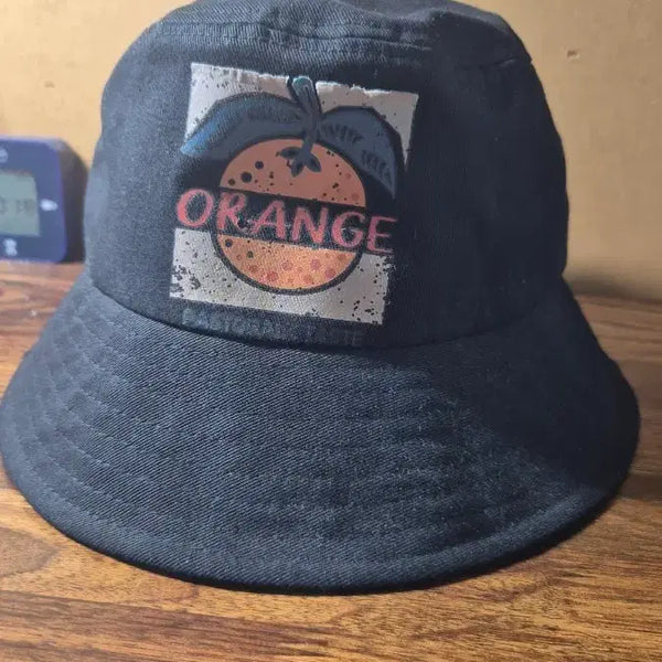 [BUNJANG] Black Bucket Hat with Orange Graphic / 오렌지 버킷햇