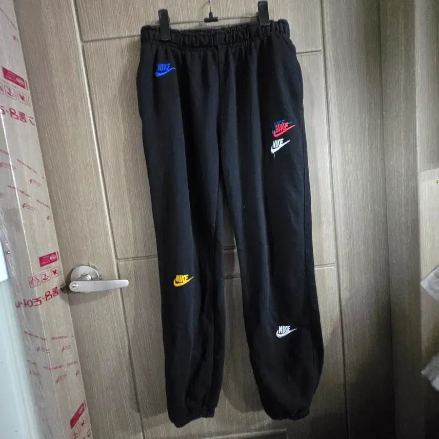 [BUNJANG] Nike Swoosh Multi Logo Jogger Training Pants Black / 나이키 스우시 멀티 로고 조거 트레이닝 팬츠 블랙