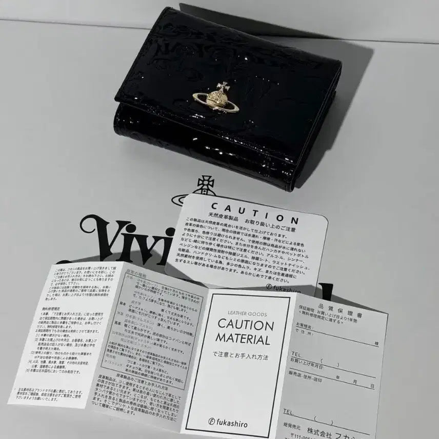 [BUNJANG] Vivienne Westwood Y2K Bifold Black Leather Relief Saturn Logo Wallet / 비비안웨스트우드 Y2K 바이폴드 블랙레더 릴리프 새턴로고 지갑