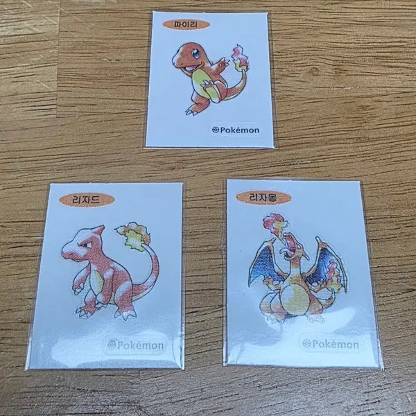[BUNJANG] Pokemon Stickers Charmander, Charmeleon, Charizard Set 30th Anniversary Artworks First Edition / 포켓몬 띠부씰 파이리 리자드 리자몽 세트 30주년 아트웍스 초판아트 판매