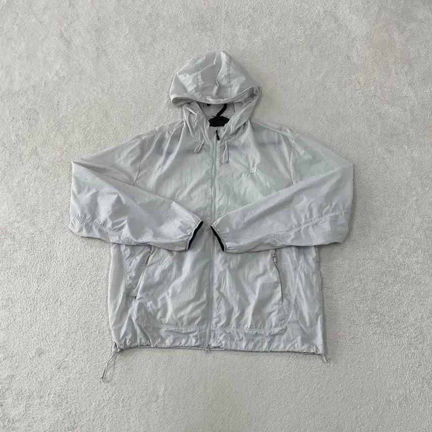 [BUNJANG] New Balance 2026 UNI AIR Lightweight Windbreaker Jacket L / L 뉴발란스 2026 UNI AIR 초경량 바람막이 자켓 100